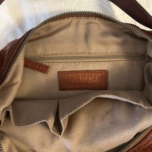 Leather tooled purse, very nice condition.